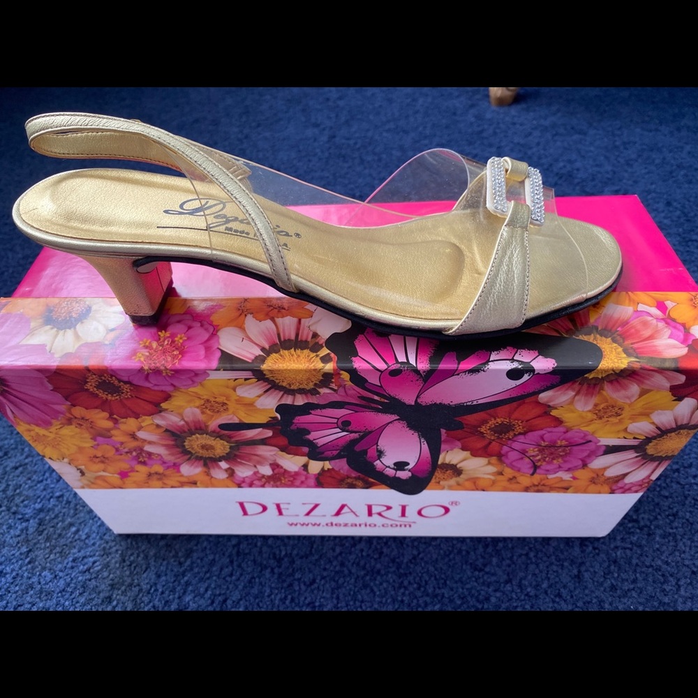 Gold sling back sandal. Low heel.